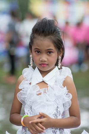 KO SAMUI,SURAT THANI - JULY 22 : Unidentified Thai students 4 - 8 years old in ceremony uniform during sport parade on July 22, 2014 in ko samui, Surat Thani, Thailand.のeditorial素材