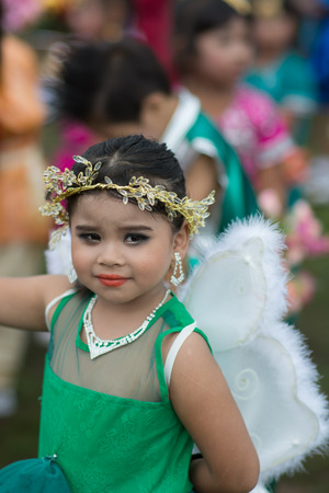 KO SAMUI,SURAT THANI - JULY 22 : Unidentified Thai students 4 - 8 years old in ceremony uniform during sport parade on July 22, 2014 in ko samui, Surat Thani, Thailand.のeditorial素材