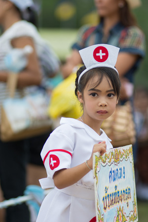 KO SAMUI,SURAT THANI - JULY 22 : Unidentified Thai students 4 - 8 years old in ceremony uniform during sport parade on July 22, 2014 in ko samui, Surat Thani, Thailand.のeditorial素材