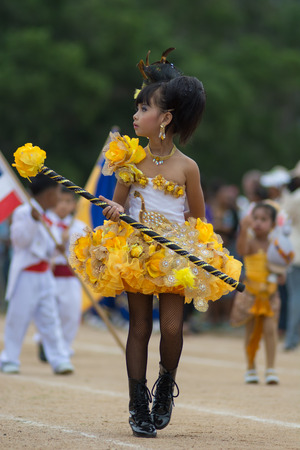 KO SAMUI,SURAT THANI - JULY 22 : Unidentified Thai students 4 - 8 years old in ceremony uniform during sport parade on July 22, 2014 in ko samui, Surat Thani, Thailand.のeditorial素材