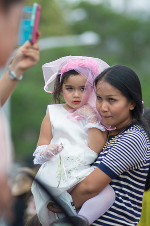 KO SAMUI,SURAT THANI - JULY 22 : Unidentified Thai students 4 - 8 years old in ceremony uniform during sport parade on July 22, 2014 in ko samui, Surat Thani, Thailand.のeditorial素材