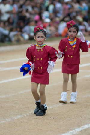 KO SAMUI,SURAT THANI - JULY 22 : Unidentified Thai students 4 - 8 years old in ceremony uniform during sport parade on July 22, 2014 in ko samui, Surat Thani, Thailand.のeditorial素材