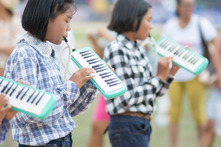 KO SAMUI,SURAT THANI - JULY 22 : Unidentified Thai students 4 - 8 years old in ceremony uniform during sport parade on July 22, 2014 in ko samui, Surat Thani, Thailand.のeditorial素材