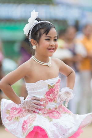 KO SAMUI,SURAT THANI - JULY 22 : Unidentified Thai students 4 - 8 years old in ceremony uniform during sport parade on July 22, 2014 in ko samui, Surat Thani, Thailand.のeditorial素材
