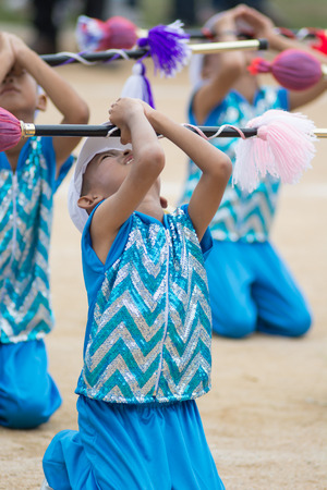 KO SAMUI,SURAT THANI - JULY 22 : Unidentified Thai students 4 - 8 years old in ceremony uniform during sport parade on July 22, 2014 in ko samui, Surat Thani, Thailand.のeditorial素材