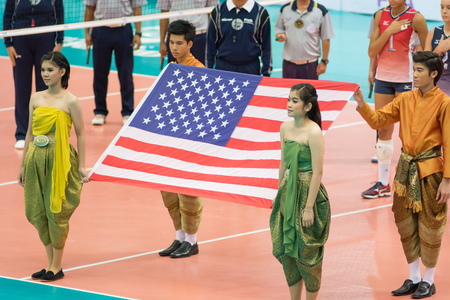 Bangkok, Thailand - August 16:Unidentified volleyball players in action during Volleyball World Grand Prix 2014 at Indoor Stadium Huamark on August 16, 2014 in Bangkok, Thailand.のeditorial素材