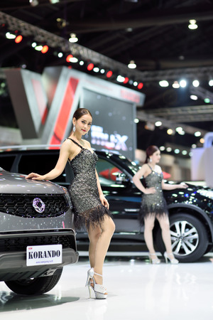 Nonthaburi,Thailand - March 24th, 2015: Ssangyong KORANDO with presenter ,showed in Thailand the 36th Bangkok International Motor Show on 24 March 2015のeditorial素材