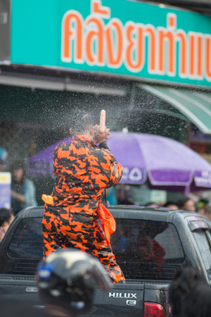 CHIANGMAI, THAILAND - APRIL 14: Foreigners and Thai people enjoy splashing water together in songkran festival on April 14, 2015in Chiangmai, Thailand.のeditorial素材