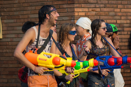 CHIANGMAI, THAILAND - APRIL 15: Foreigners and Thai people enjoy splashing water together in songkran festival on April 15, 2015in Chiangmai, Thailand.のeditorial素材