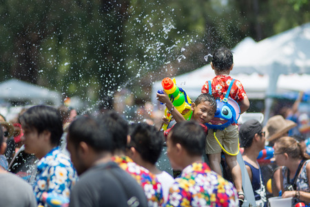 CHIANGMAI, THAILAND - APRIL 13: Foreigners and Thai people enjoy splashing water together in songkran festival on April 13, 2015in Chiangmai, Thailand.のeditorial素材