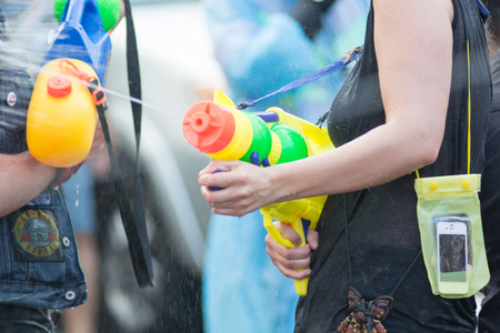 CHIANGMAI, THAILAND - APRIL 14: Foreigners and Thai people enjoy splashing water together in songkran festival on April 14, 2015in Chiangmai, Thailand.のeditorial素材