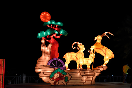 Chinese cartoon character lantern at night, Thailand.