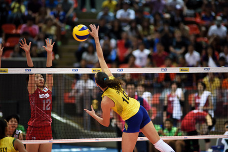 Bangkok, Thailand - July 3-5 ,2015 : Group 1 women volleyball players in action in The 23rd edition of the FIVB Volleyball World Grand Prix at Hua Mak Sport Complex.のeditorial素材