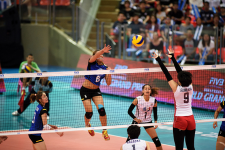 Bangkok, Thailand - July 3-5 ,2015 : Group 1 women volleyball players in action in The 23rd edition of the FIVB Volleyball World Grand Prix at Hua Mak Sport Complex.のeditorial素材