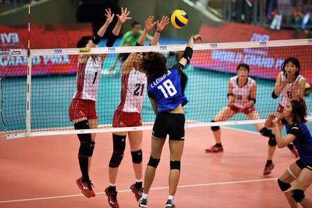 Bangkok, Thailand - July 3-5 ,2015 : Group 1 women volleyball players in action in The 23rd edition of the FIVB Volleyball World Grand Prix at Hua Mak Sport Complex.のeditorial素材