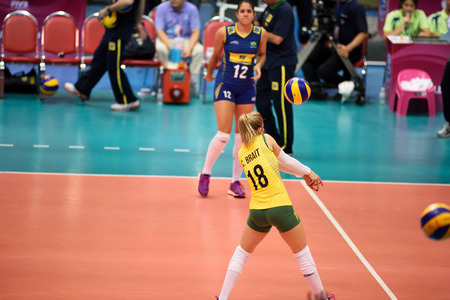 Bangkok, Thailand - July 3-5 ,2015 : Group 1 women volleyball players in action in The 23rd edition of the FIVB Volleyball World Grand Prix at Hua Mak Sport Complex.のeditorial素材