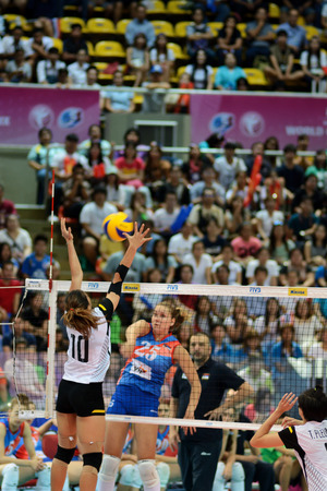 Bangkok, Thailand - July 3-5 ,2015 : Group 1 women volleyball players in action in The 23rd edition of the FIVB Volleyball World Grand Prix at Hua Mak Sport Complex.のeditorial素材