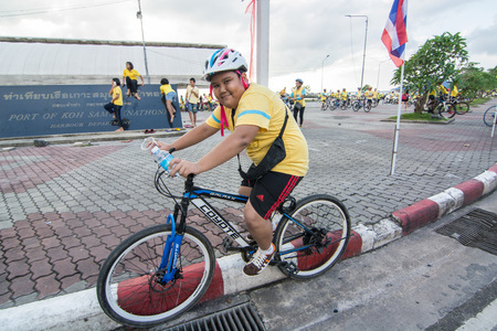 Ko Smui Surat thani, THAILAND, December 11-2015 : This event is "Bike for dad " from Thailand. Bike for dad event show respected to king and make Thailand's cyclists ride along the city road.のeditorial素材