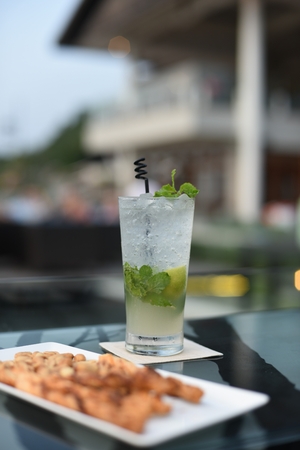 Non alcohol cocktail shallow focus out of focus building backgroung.の写真素材