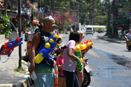 KO SAMUI, THAILAND - APRIL 13: Foreigners and Thai people enjoy splashing water together in songkran festival on April 13, 2018 in Ko Samui island, Thailand.のeditorial素材