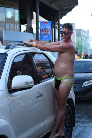 KO SAMUI, THAILAND - APRIL 13: Foreigners and Thai people enjoy splashing water together in songkran festival on April 13, 2018 in Ko Samui island, Thailand.のeditorial素材