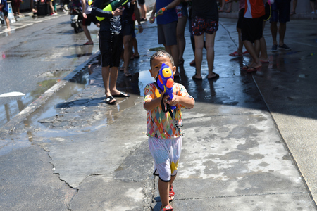 KO SAMUI, THAILAND - APRIL 13: Foreigners and Thai people enjoy splashing water together in songkran festival on April 13, 2018 in Ko Samui island, Thailand.のeditorial素材