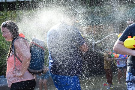 KO SAMUI, THAILAND - APRIL 13: Foreigners and Thai people enjoy splashing water together in songkran festival on April 13, 2018 in Ko Samui island, Thailand.のeditorial素材