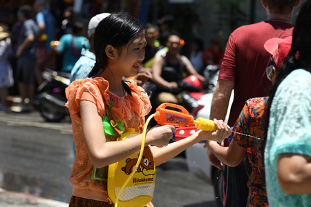 KO SAMUI, THAILAND - APRIL 13: Foreigners and Thai people enjoy splashing water together in songkran festival on April 13, 2018 in Ko Samui island, Thailand.のeditorial素材