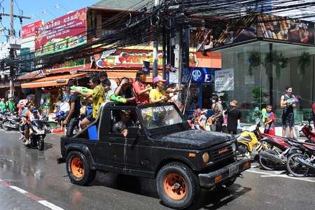 KO SAMUI, THAILAND - APRIL 13: Foreigners and Thai people enjoy splashing water together in songkran festival on April 13, 2018 in Ko Samui island, Thailand.のeditorial素材