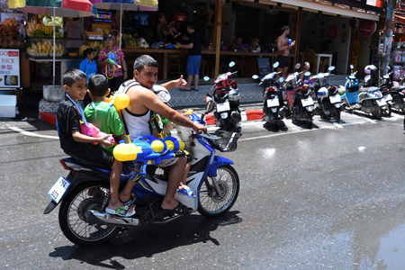 KO SAMUI, THAILAND - APRIL 13: Foreigners and Thai people enjoy splashing water together in songkran festival on April 13, 2018 in Ko Samui island, Thailand.のeditorial素材