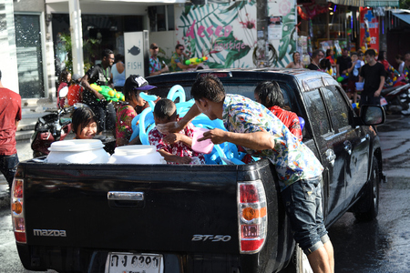 KO SAMUI, THAILAND - APRIL 13: Foreigners and Thai people enjoy splashing water together in songkran festival on April 13, 2018 in Ko Samui island, Thailand.のeditorial素材