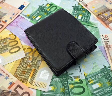 Purse on a banknotesの写真素材