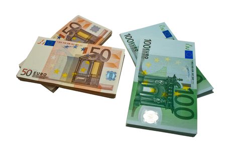 Packs of  banknotes on a white backgroundの写真素材