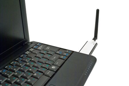 Notebook and external wireless USB adapterの写真素材