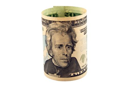 American dollars rolled up isolated on the white の写真素材