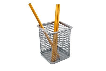 pencils in empty containers of pencils isolated on a whiteの写真素材