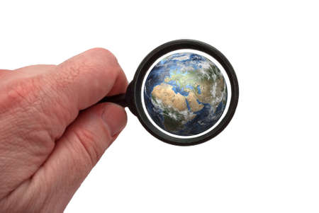 Earth with magnifying glass on a white background  の写真素材