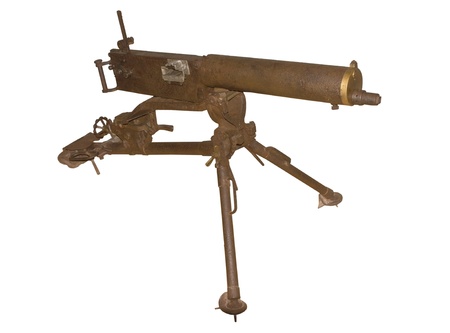 Old machine gun on white