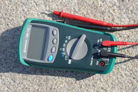the Digital multimeter under a bright sunlightの写真素材
