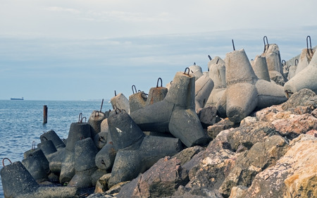 big breakwater on the seaの写真素材