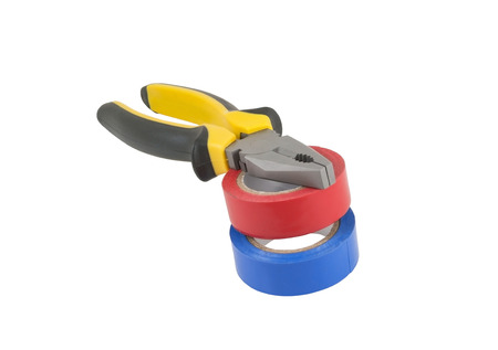 Pliers and Adhesive plastic tape  on white backgroundの写真素材