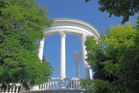Architectural construction with columns on a background skyの写真素材