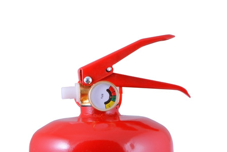 Top of red fire extinguisher on white background