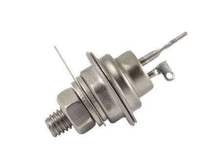Powerful metal thyristor on a white background