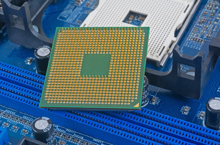 Empty CPU processor socket with pins on motherboard