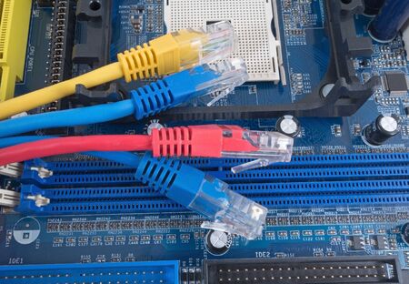 colorful network cable on computer motherboard
