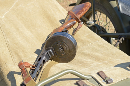 old Soviet Machine gun on background canvas