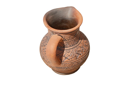 clay jug handmade isolated on white backgroundの写真素材