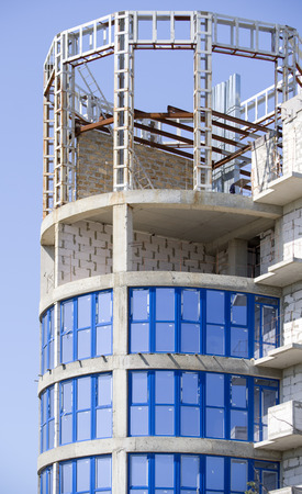 building under construction against the blue skyの写真素材