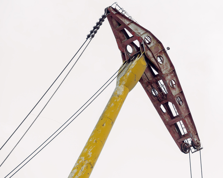 old port crane on white backgroundの写真素材